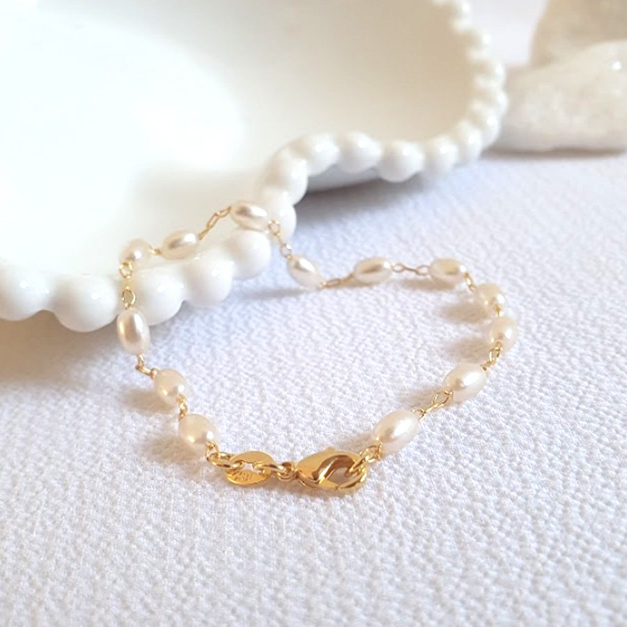 PULSEIRA FEMININA COM PÉROLAS OVAIS