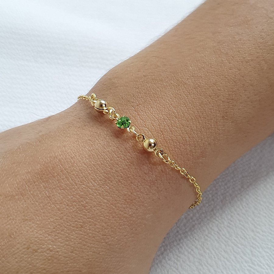 PULSEIRA INFANTIL COM DUAS BOLINHAS E UM STRASS