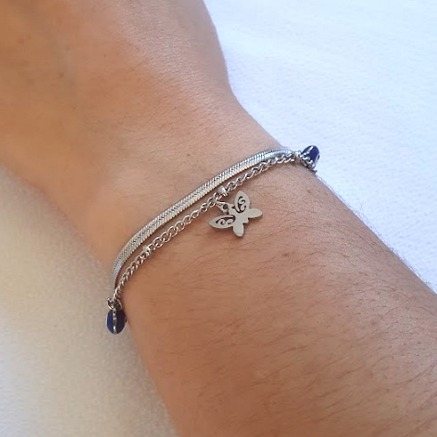 PULSEIRA AÇO INOX COM UMA BORBOLETA E QUATRO OLHOS GREGOS