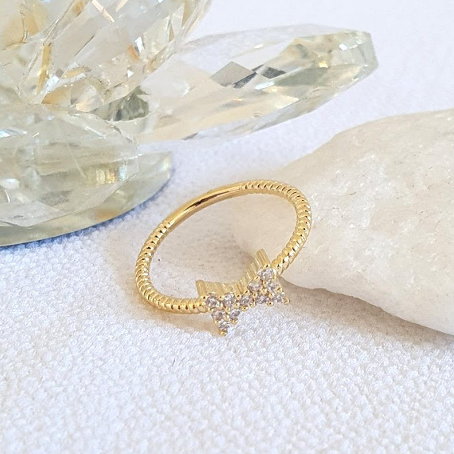 ANEL TRANÇADO COM LAÇO CRAVEJADO