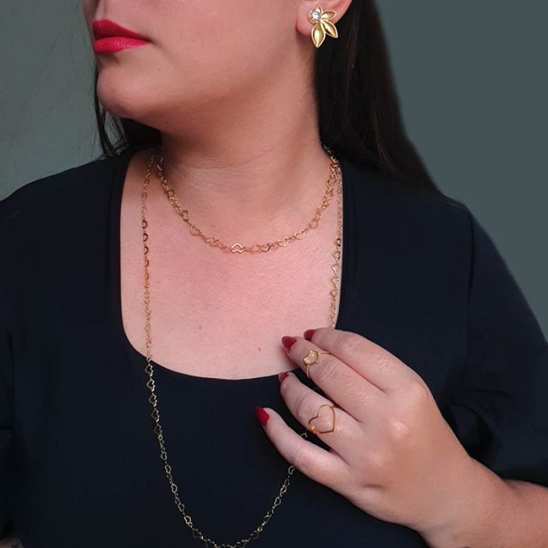ANEL COM ZIRCÔNIAS E CORAÇÃO LISO VAZADO