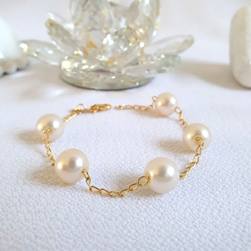 PULSEIRA FEMININA COM CINCO PÉROLAS