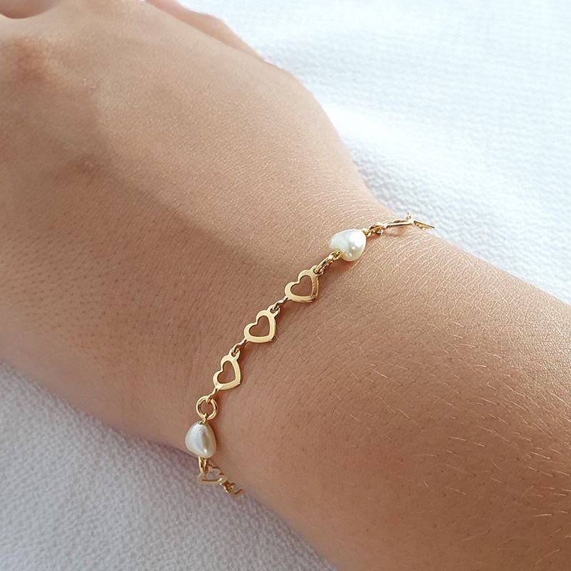 PULSEIRA FEMININA PÉROLAS DE CORAÇÕES