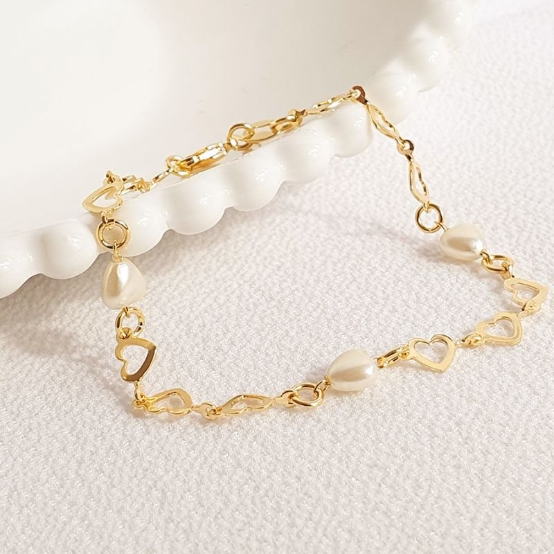 PULSEIRA FEMININA PÉROLAS DE CORAÇÕES